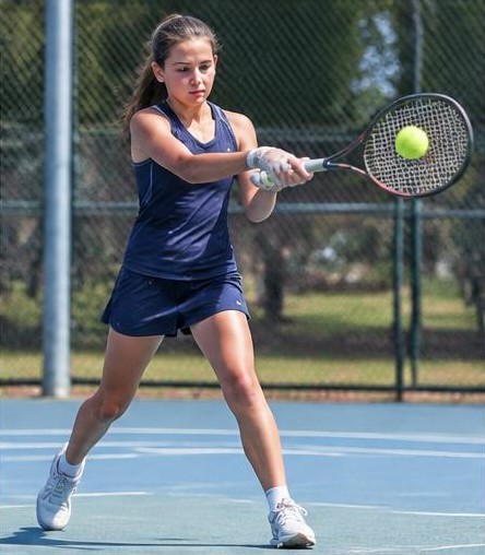 Junior tennis player in action